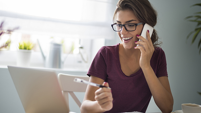 A woman talking on phone